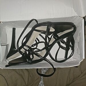 Strappy black high heels
